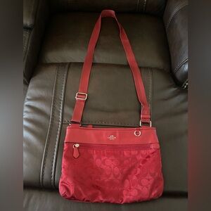 Authentic Coach light red/burgundy bag in great condition.
